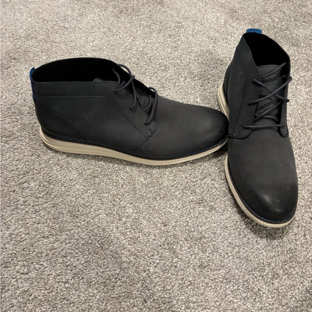 Cole Haan navy blue boots.